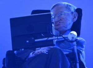 British physicist Stephen Hawking sits in the Olympic Stadium during the opening ceremony of the London 2012 Paralympic Games