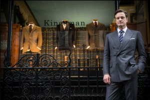 kingsman colin in front of suit store